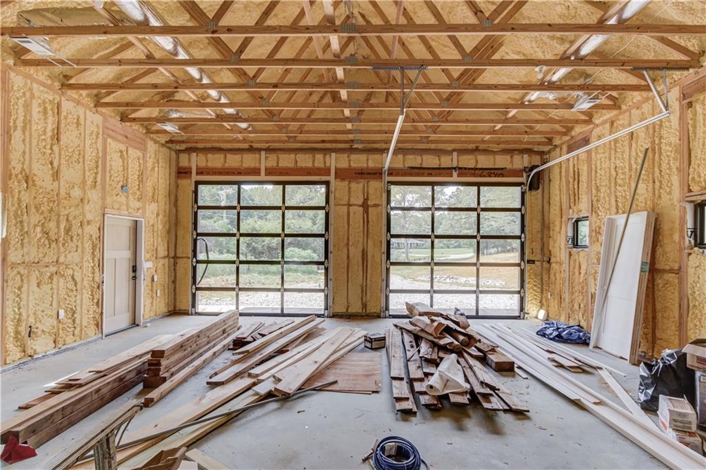 6700 Shady Grove Road Cumming, GA 30041 - Photo 63 of 69 a room with gym equipment and large window
