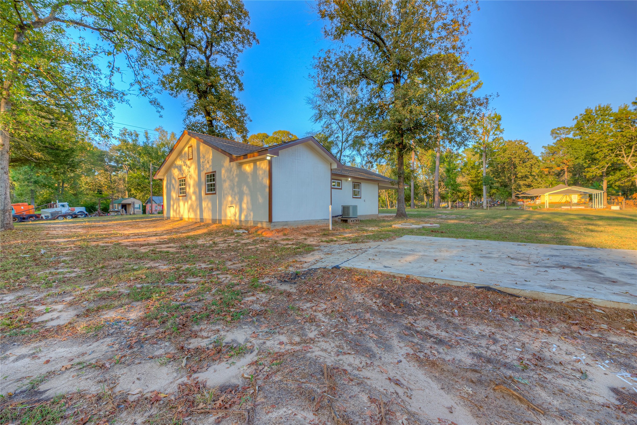 388 Sunrise Wood Road Goodrich, TX 77335 - Photo 22 of 33 a front view of a house with a yard and trees