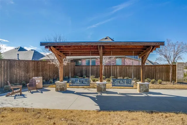 an aerial view of a house with a garden