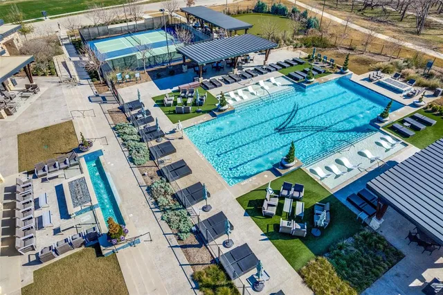 a view of a swimming pool with a lake