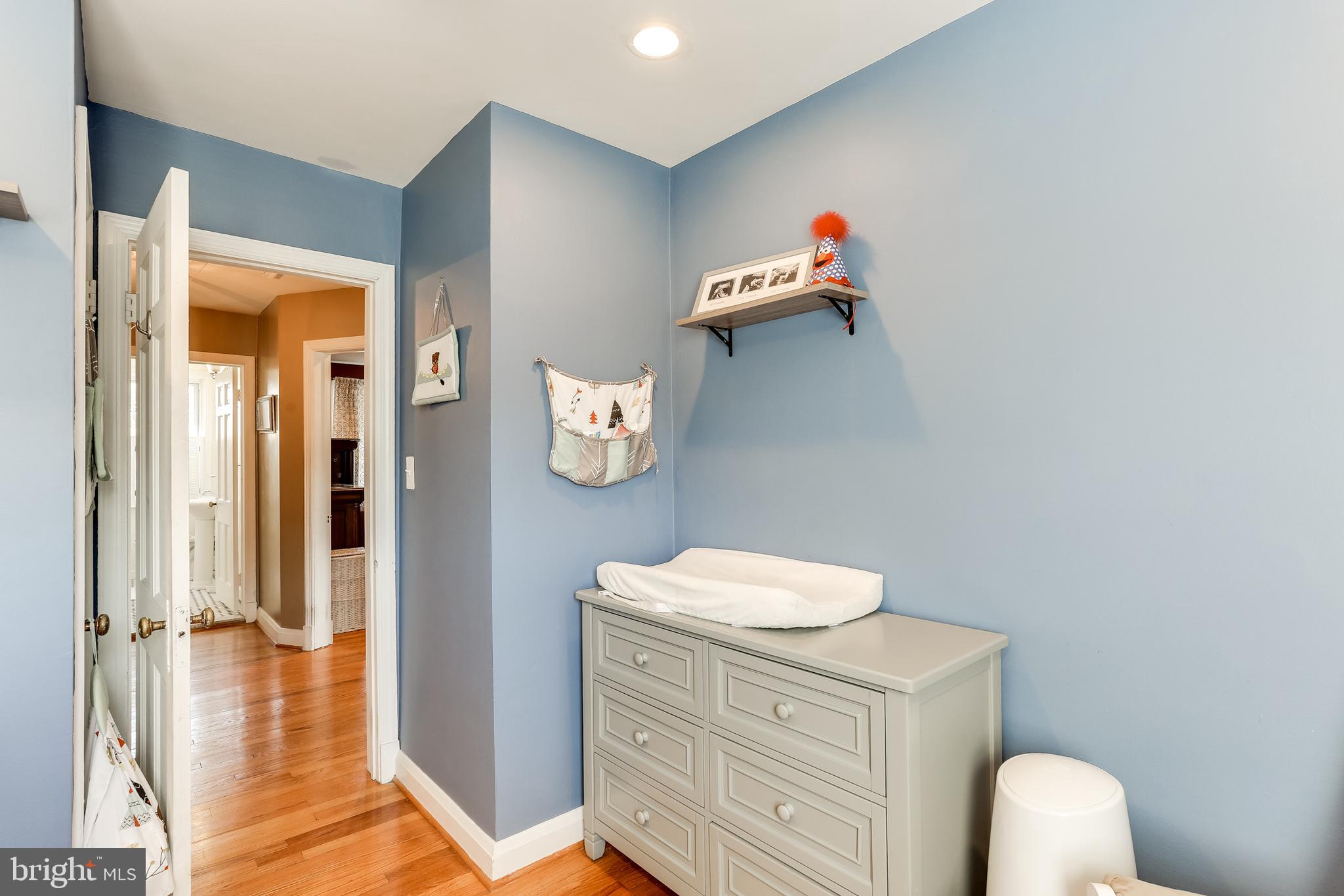 402 Stratford Road Baltimore, MD 21228 - Photo 16 of 25 3rd bedroom w/ Hardwood floors
