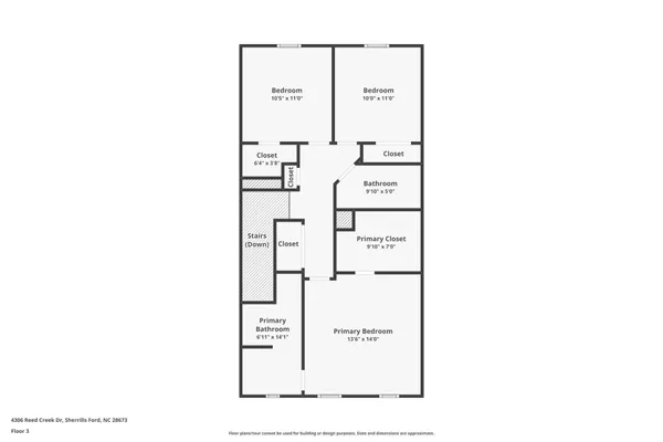 front view of a brick house with many windows