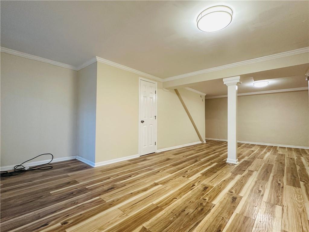 405 Fairburn Road Southwest, Unit 122 Atlanta, GA 30331 - Photo 11 of 26 a view of a room with wooden floor