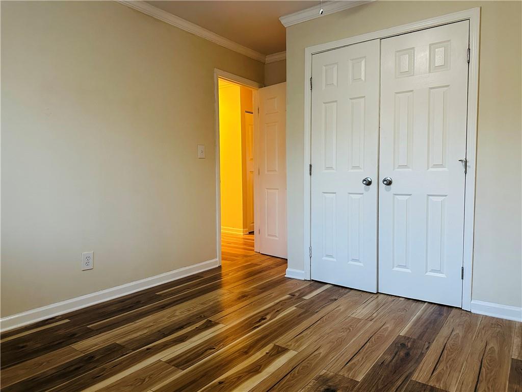 405 Fairburn Road Southwest, Unit 122 Atlanta, GA 30331 - Photo 22 of 26 a view of a room with wooden floor