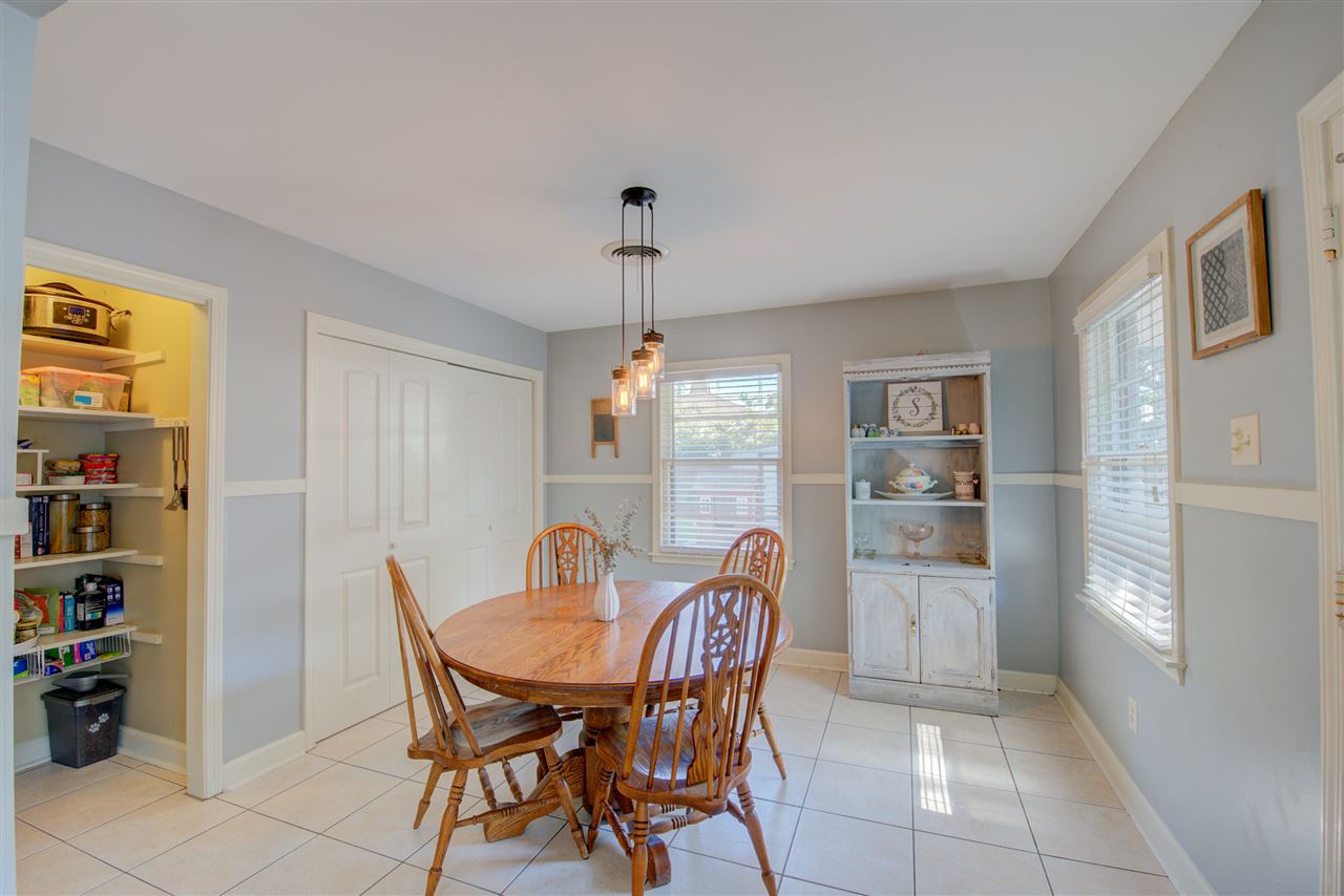 4792 Dee Road Memphis, TN 38117 - Photo 7 of 24 a view of a dining room with furniture and window