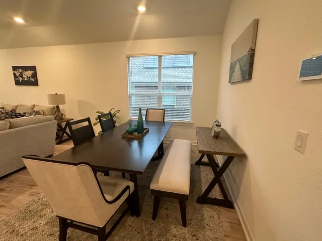 a view of a workspace with furniture