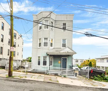a front view of a multi story residential apartment building