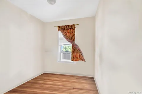 a view of a hallway with front door