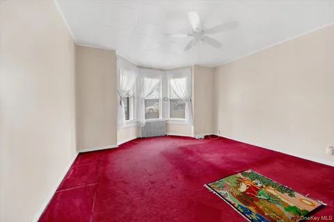 a big room with windows and closet