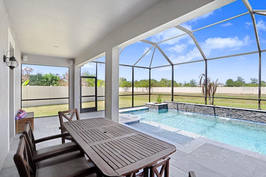 11719 Albatross Lane Riverview, FL 33569 - Photo 23 of 51 a view of a living room and floor to ceiling window
