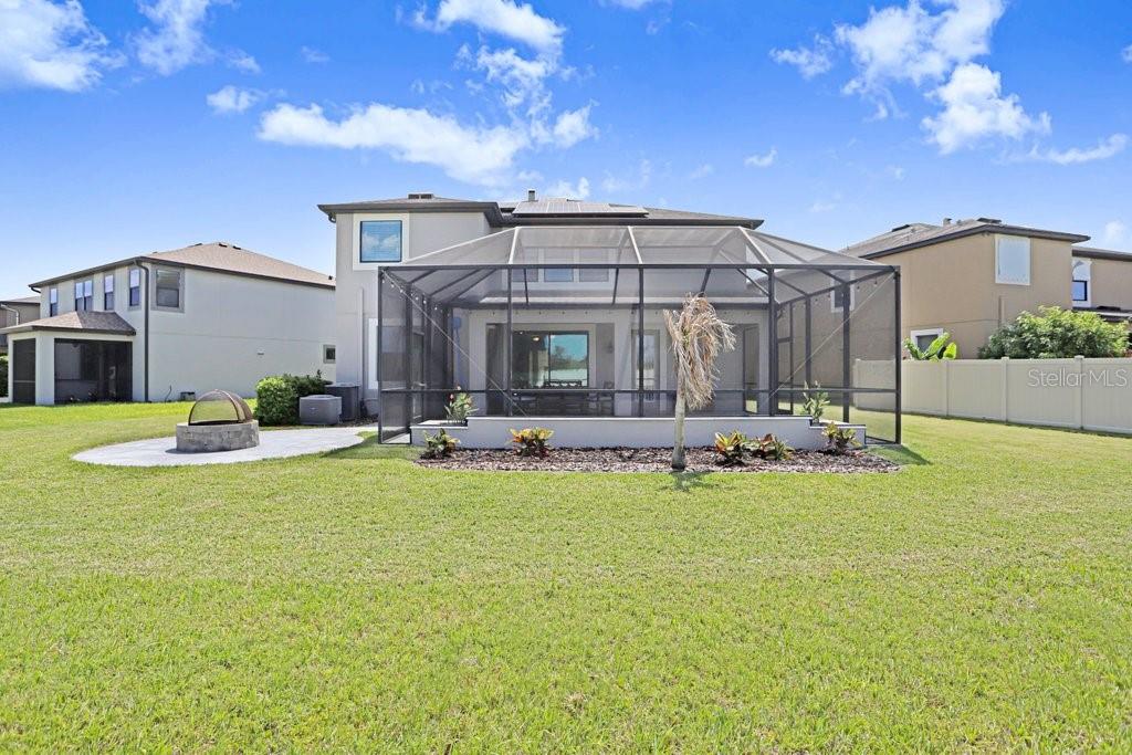 11719 Albatross Lane Riverview, FL 33569 - Photo 27 of 51 a view of swimming pool with outdoor seating and house in the background
