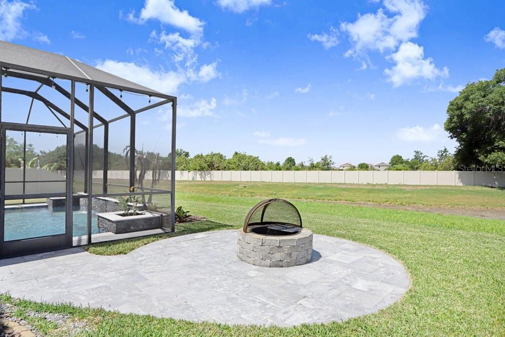 11719 Albatross Lane Riverview, FL 33569 - Photo 28 of 51 a view of a swimming pool and a yard