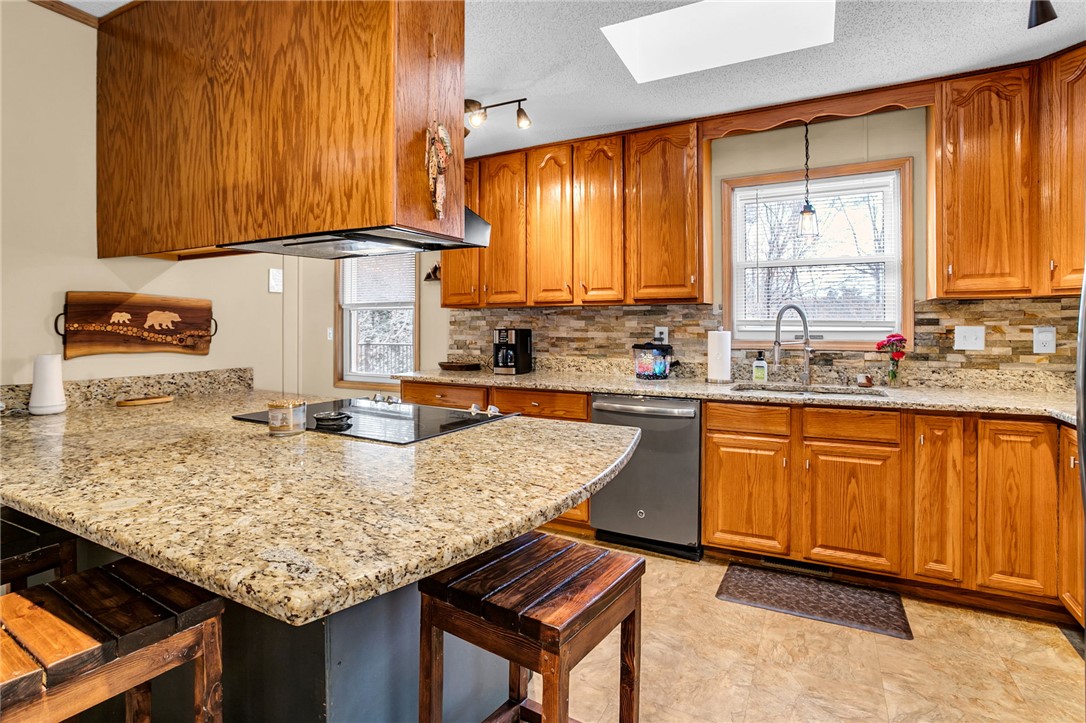 130 Greenbrier Road Salem, SC 29676 - Photo 24 of 42 This spacious kitchen offers ample countertop space and rich cabinetry, perfect for culinary endeavors.