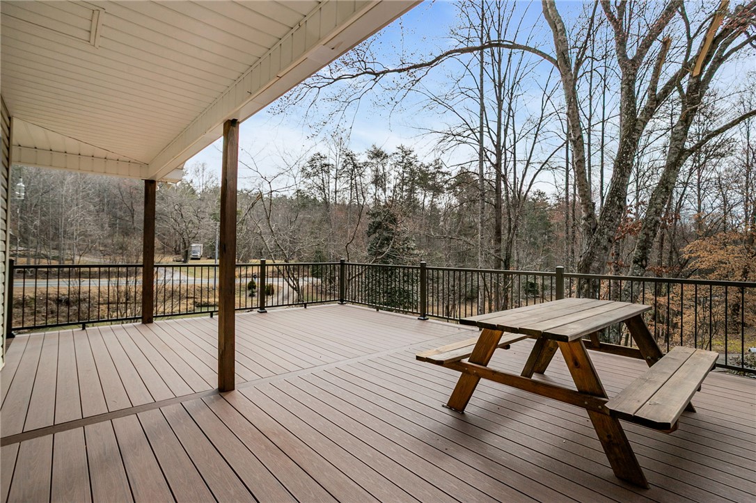 130 Greenbrier Road Salem, SC 29676 - Photo 26 of 42 Enjoy the peaceful woodland views from this spacious outdoor living area.