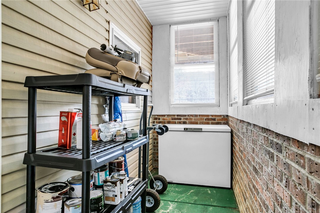 130 Greenbrier Road Salem, SC 29676 - Photo 33 of 42 This functional utility room offers practical storage solutions with brick and siding walls.