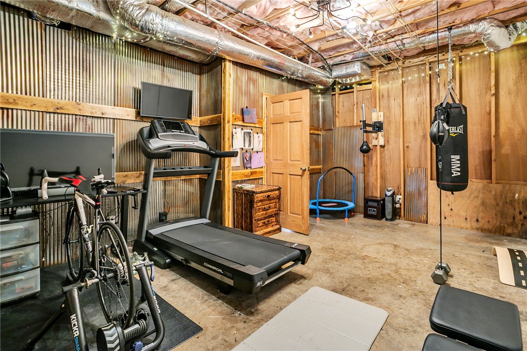 130 Greenbrier Road Salem, SC 29676 - Photo 36 of 42 This versatile basement space offers an ideal setting for recreation or a dedicated fitness area.