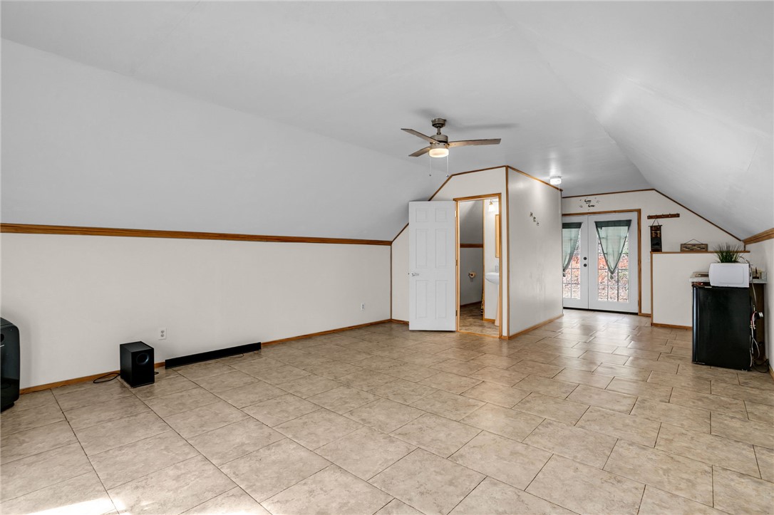 130 Greenbrier Road Salem, SC 29676 - Photo 37 of 42 This versatile loft features durable tile flooring, providing ample space for various uses.