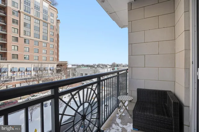 a view of balcony with a potted plant