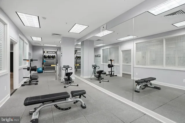 a view of a wooden floor and chandelier