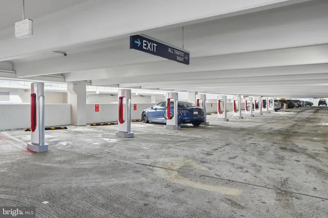 a group of cars parked in front of building