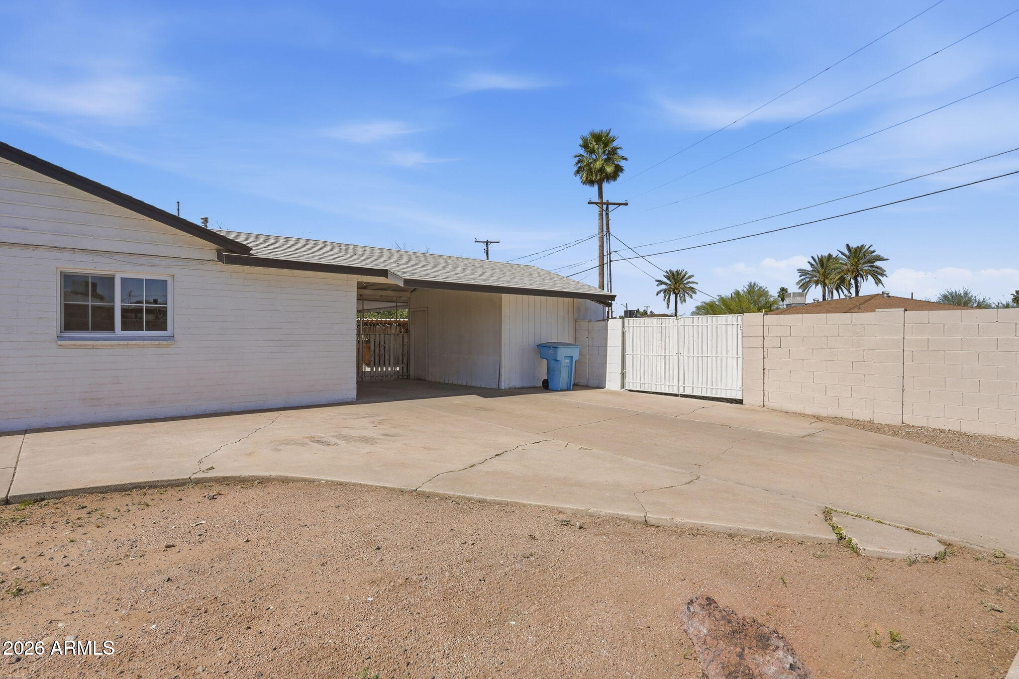2206 West Rancho Drive Phoenix, AZ 85015 - Photo 28 of 29 a view of garage and a window