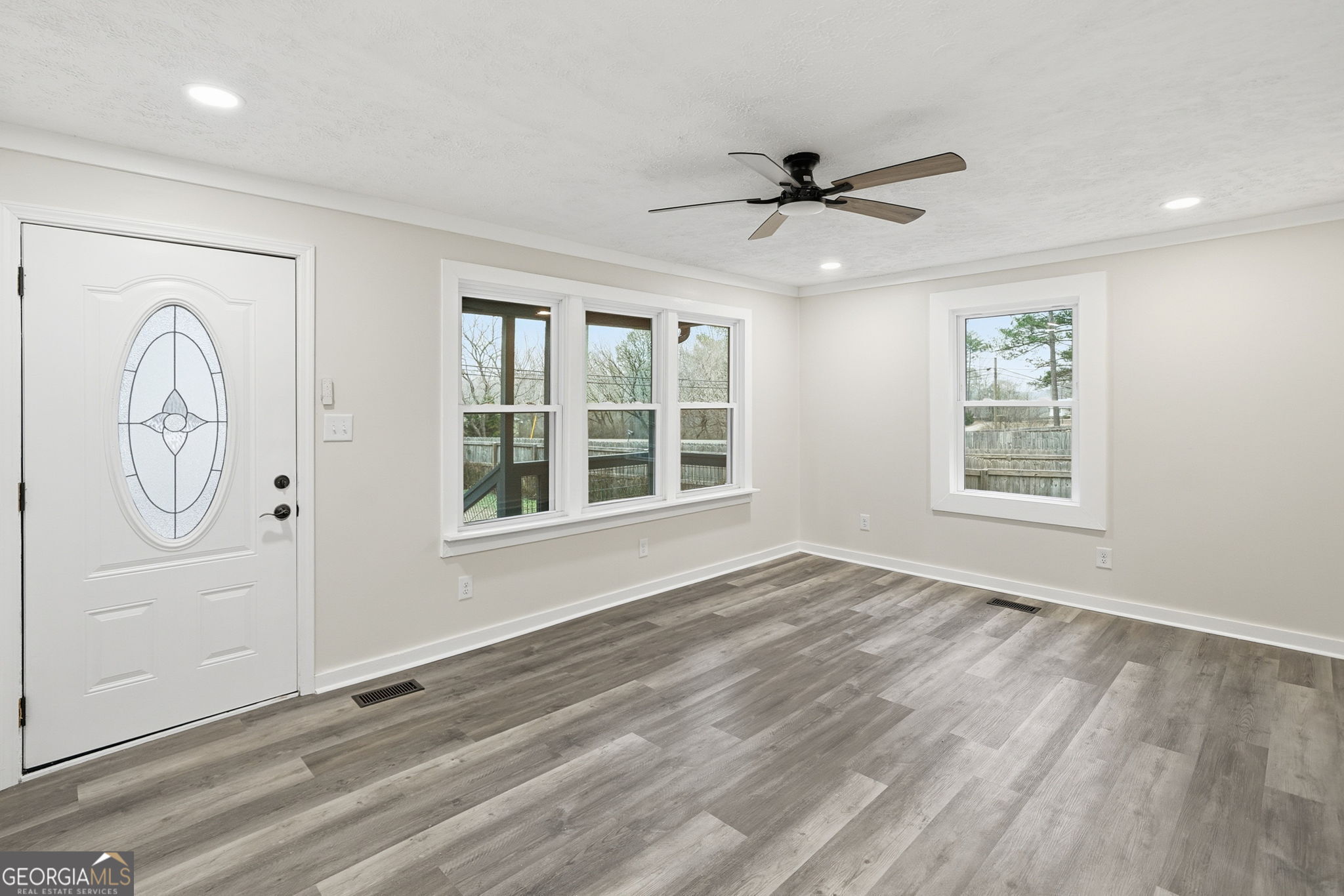 1734 Ball Ground Road Ball Ground, GA 30107 - Photo 13 of 31 a view of an empty room with a window
