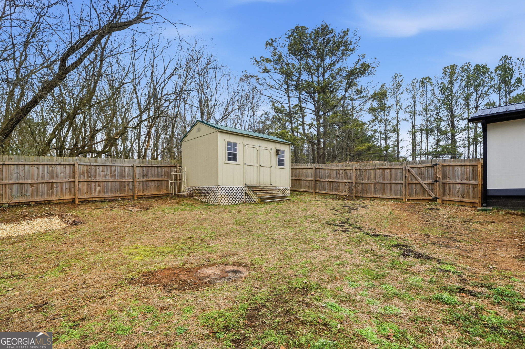 1734 Ball Ground Road Ball Ground, GA 30107 - Photo 29 of 31 a view of backyard space and deck