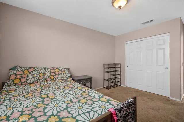 a view of backyard with outdoor seating and green space