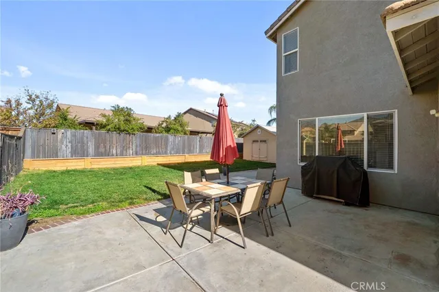 a front view of house with yard and seating area