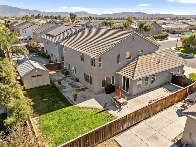 an aerial view of residential building with lake view