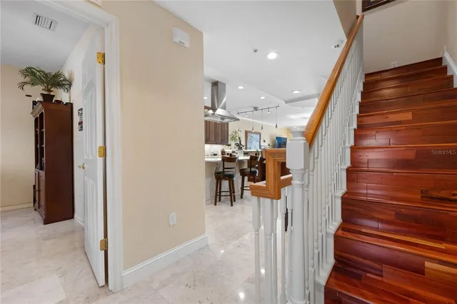 a view of a balcony with chairs