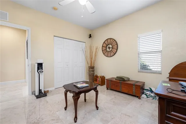 a view of a balcony with chairs