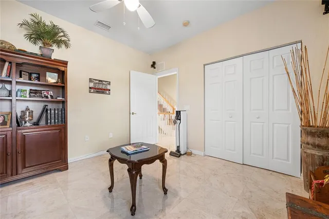 a kitchen with a stove sink and cabinets