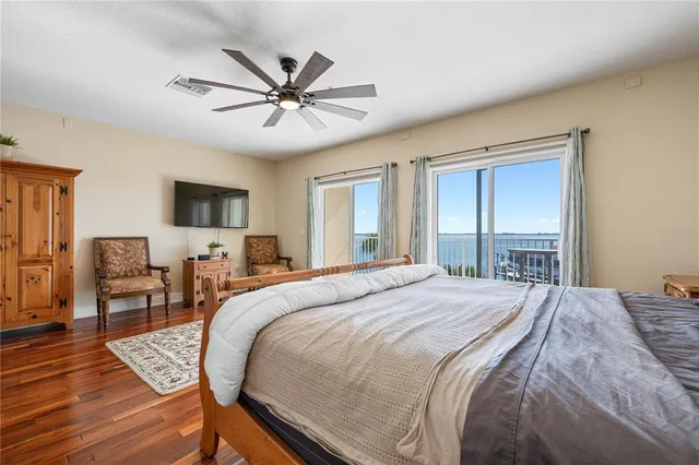 a bedroom with a bed and dresser