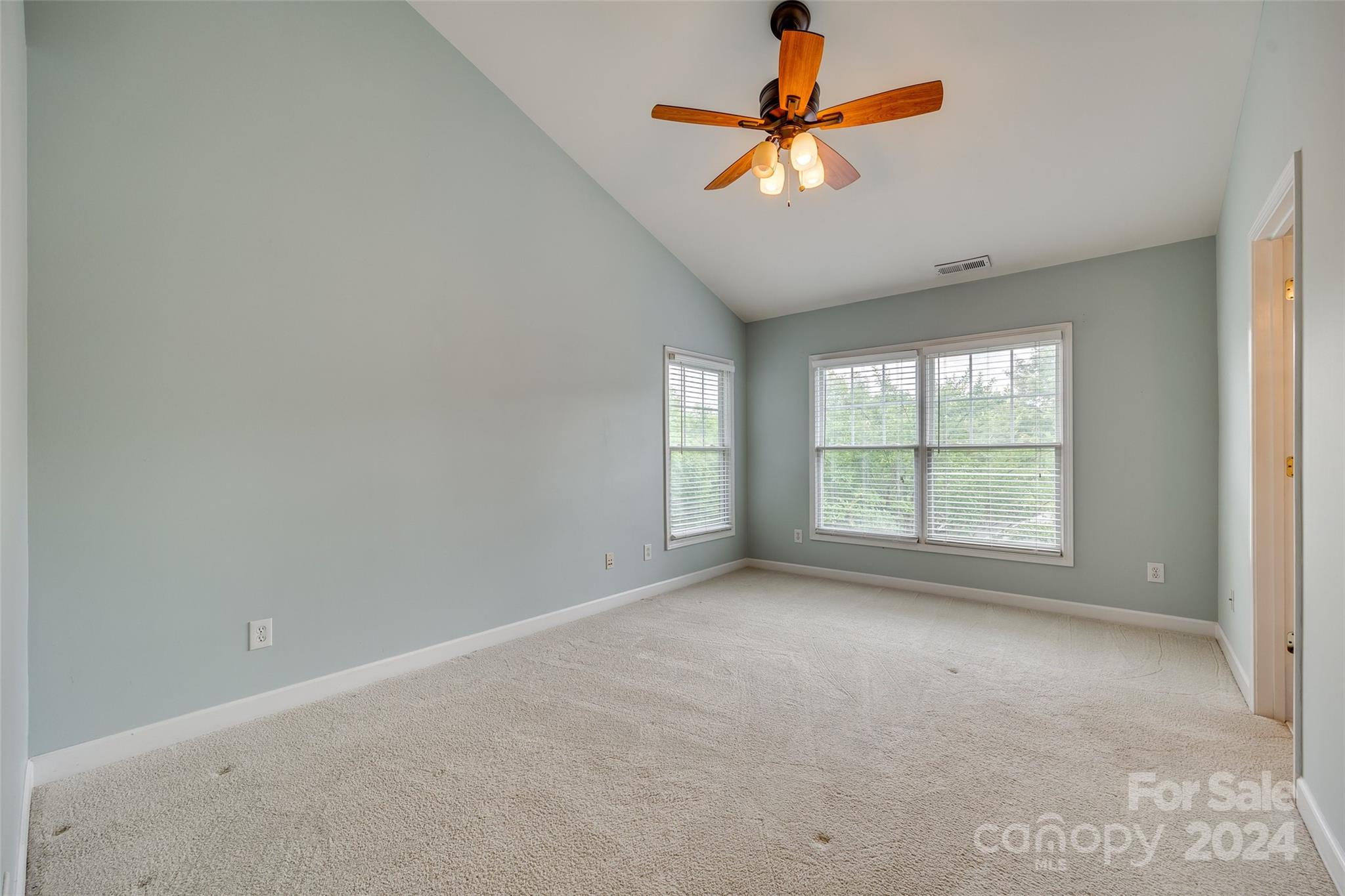 1107 Market Street Fort Mill, SC 29708 - Photo 16 of 30 an empty room with windows and fan