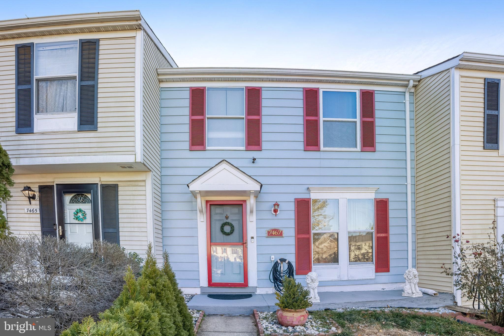 7467 Lone Star Road Lorton, VA 22079 - Photo 17 of 21 a front view of a house with plants