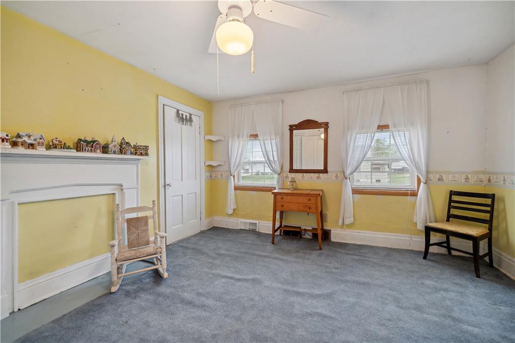 401 Delafayette Street Perryopolis, PA 15473 - Photo 20 of 32 a living room with furniture and a table