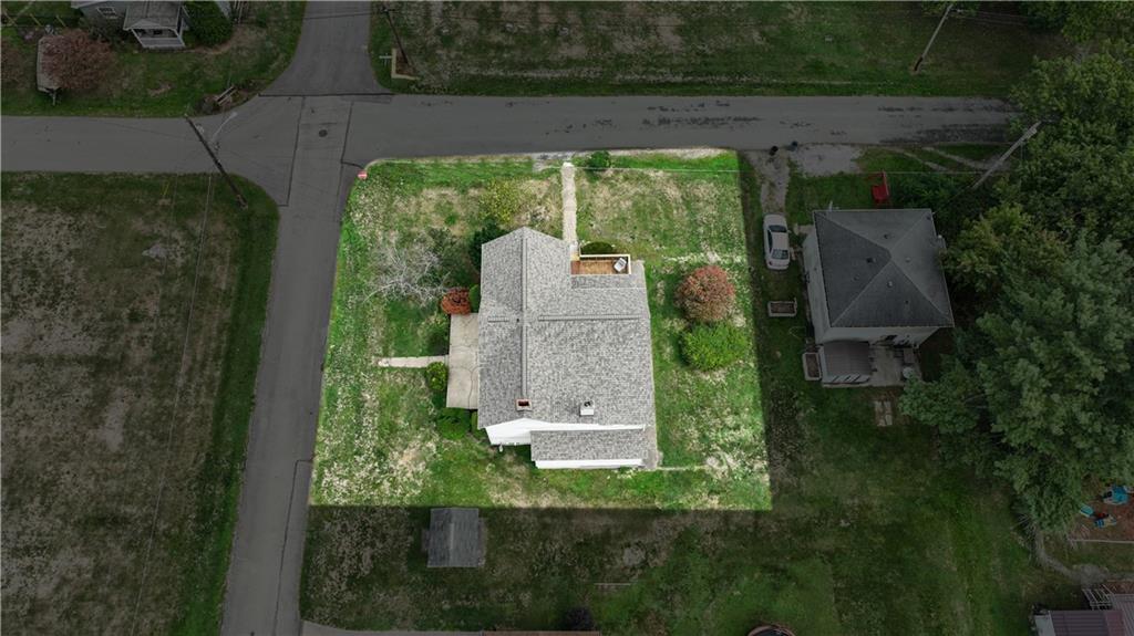401 Delafayette Street Perryopolis, PA 15473 - Photo 28 of 32 an aerial view of a house with a yard and large tree
