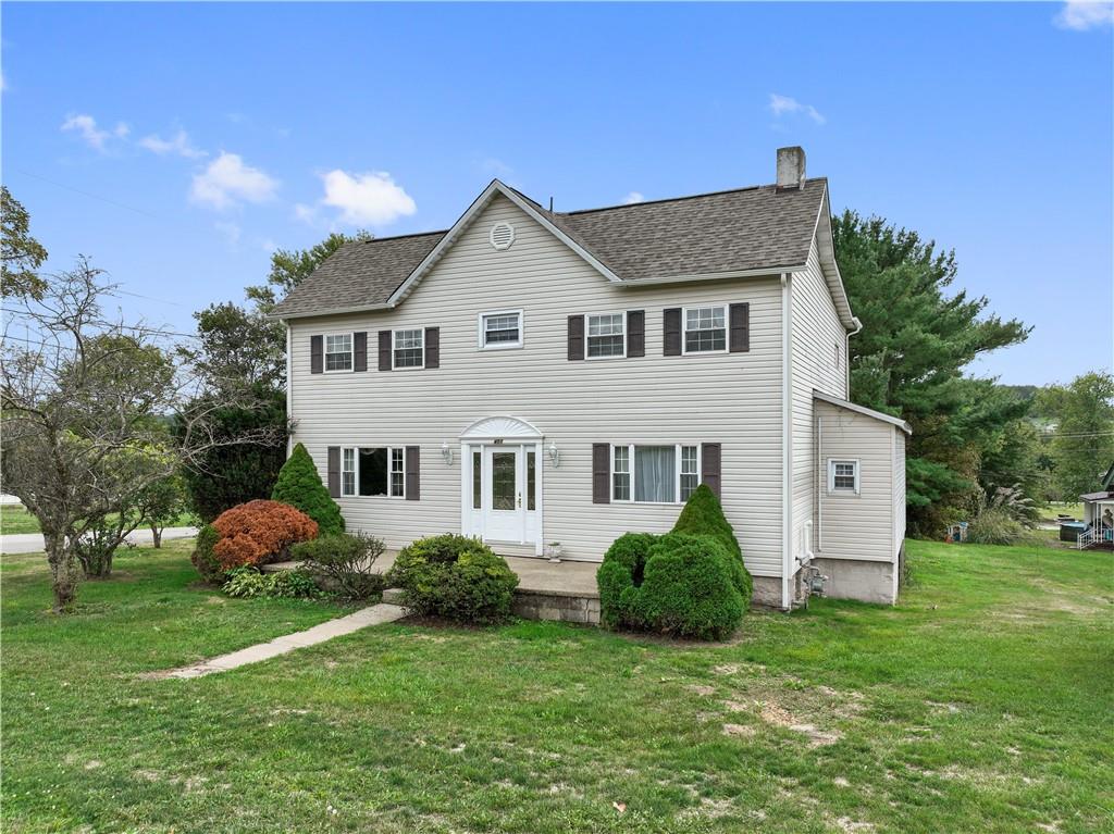 401 Delafayette Street Perryopolis, PA 15473 - Photo 32 of 32 a front view of a house with garden