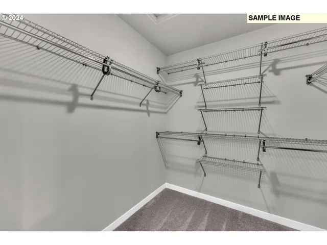 a view of a room with racks on the wall