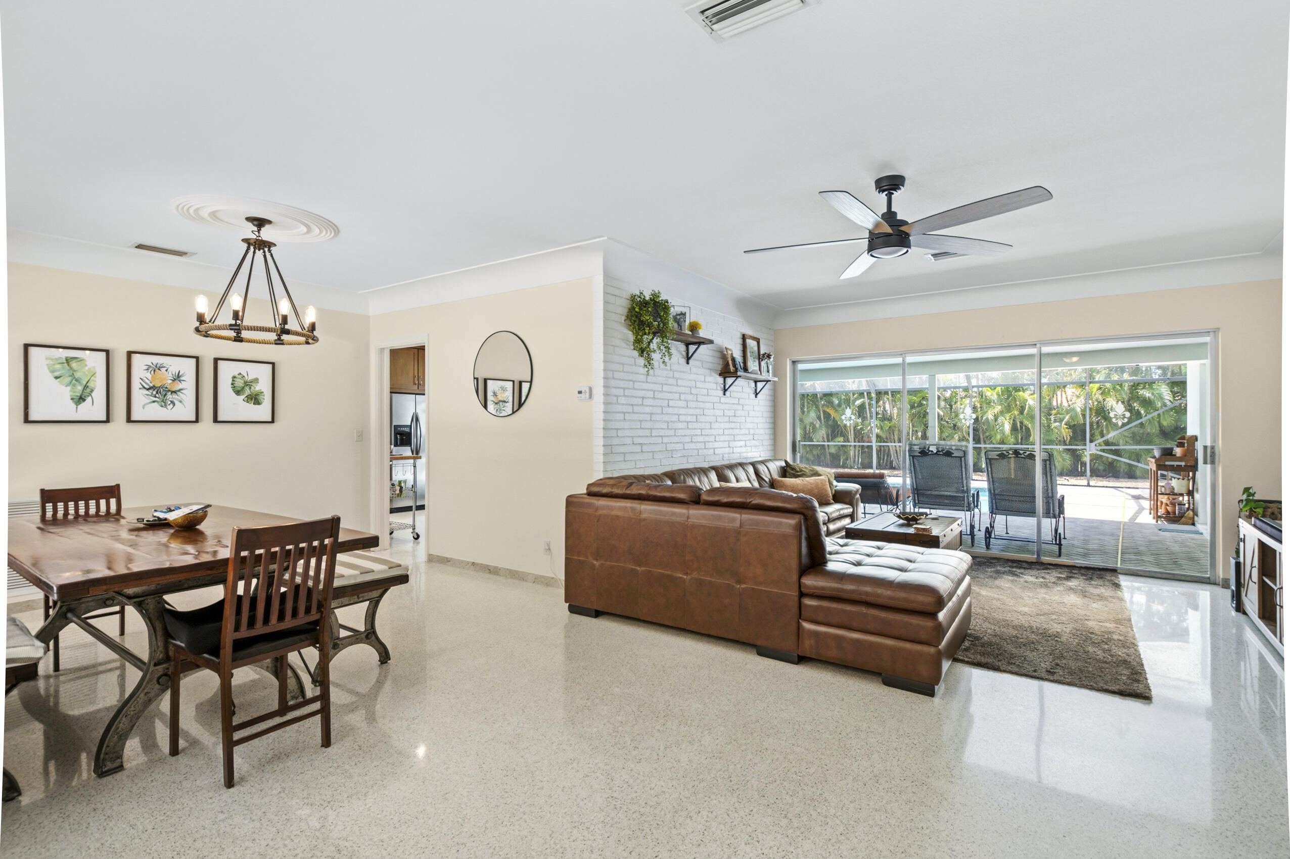 1348 Southwest 4th Street Boca Raton, FL 33486 - Photo 7 of 44 a living room with furniture and a large window