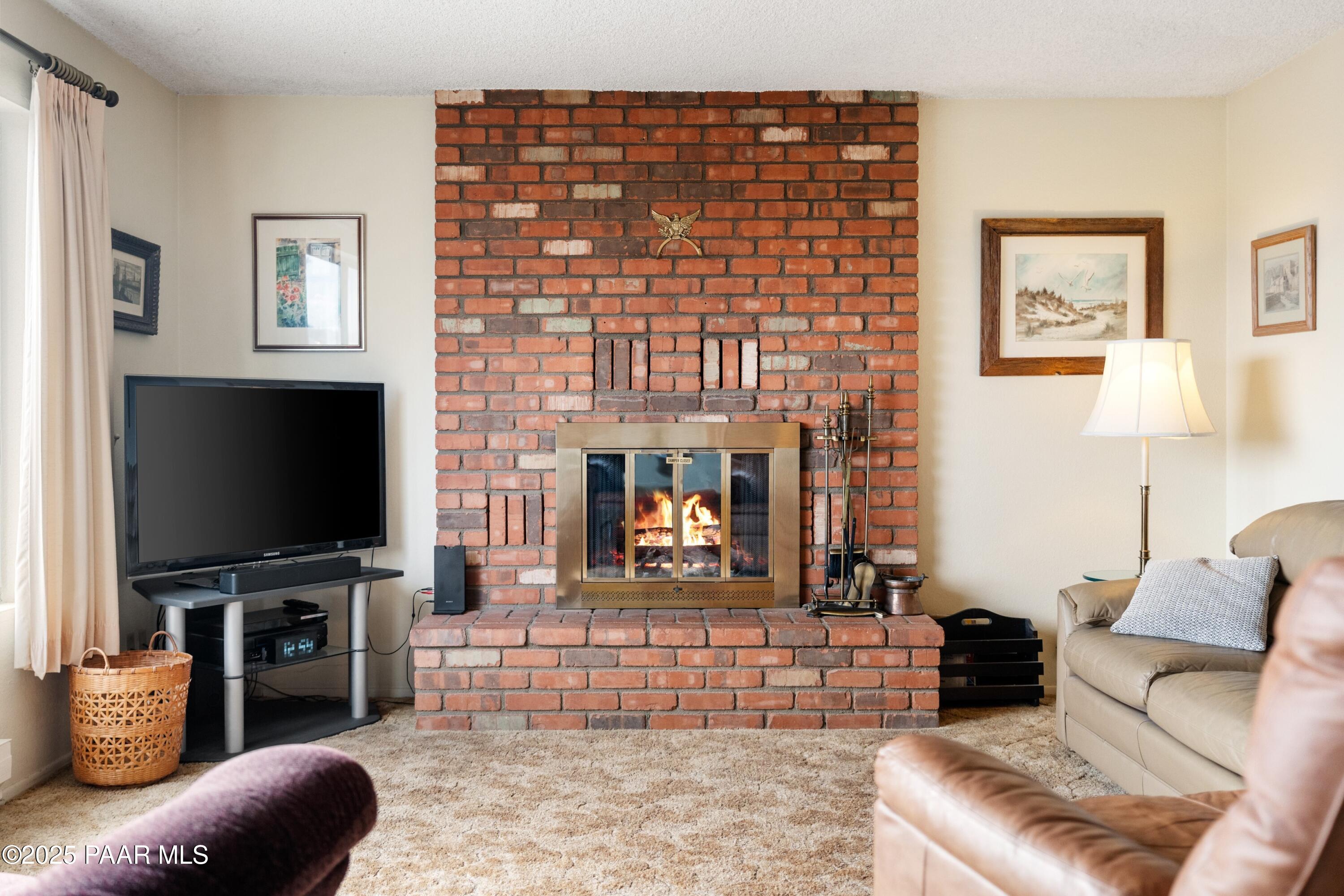 2198 Tonto Ridge Road Prescott, AZ 86305 - Photo 6 of 31 006_Living Room Wood burninFireplace