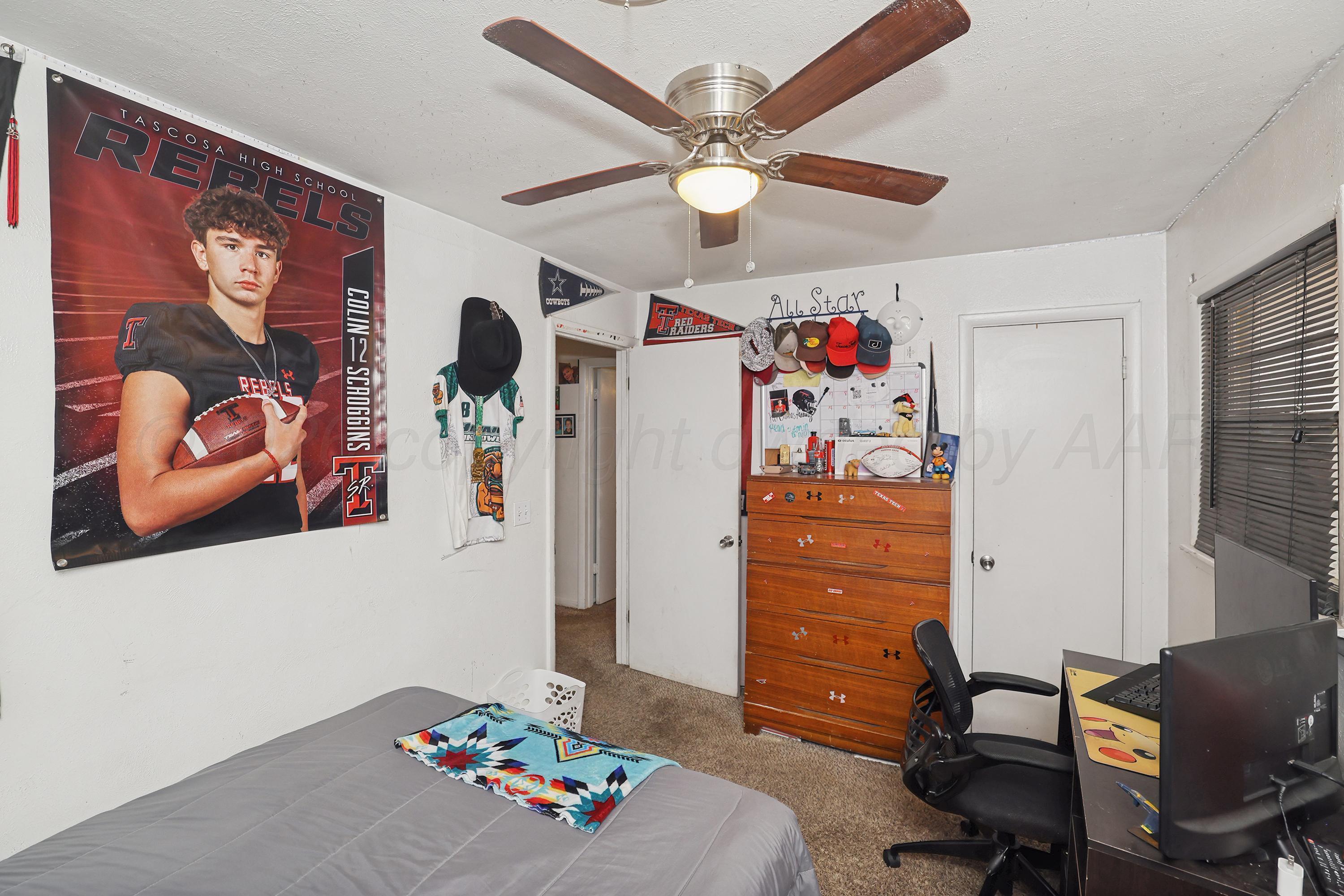 2321 Bell Street Amarillo, TX 79106 - Photo 13 of 24 a workspace with furniture and ceiling fan
