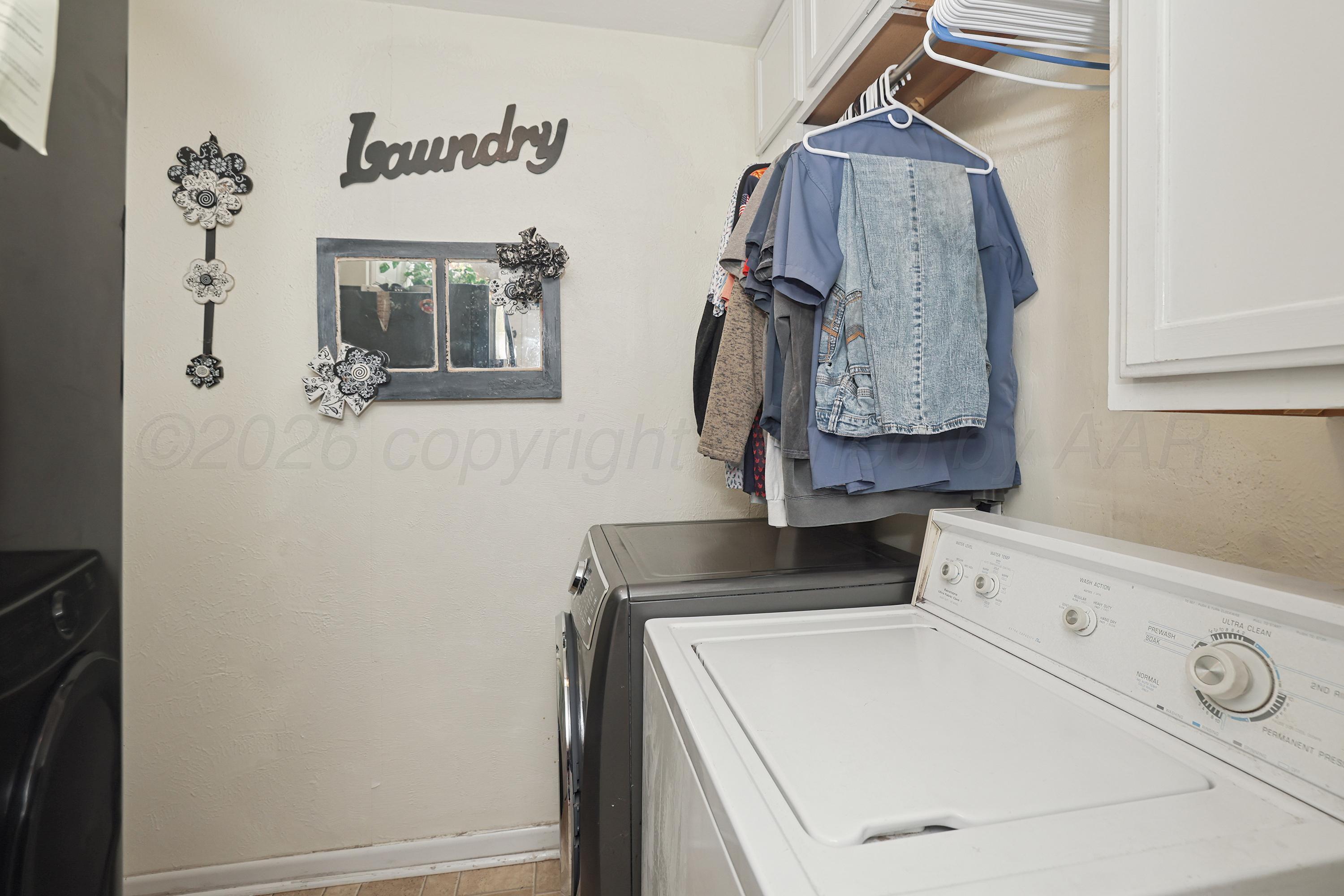 2321 Bell Street Amarillo, TX 79106 - Photo 18 of 24 a utility room with dryer and washer