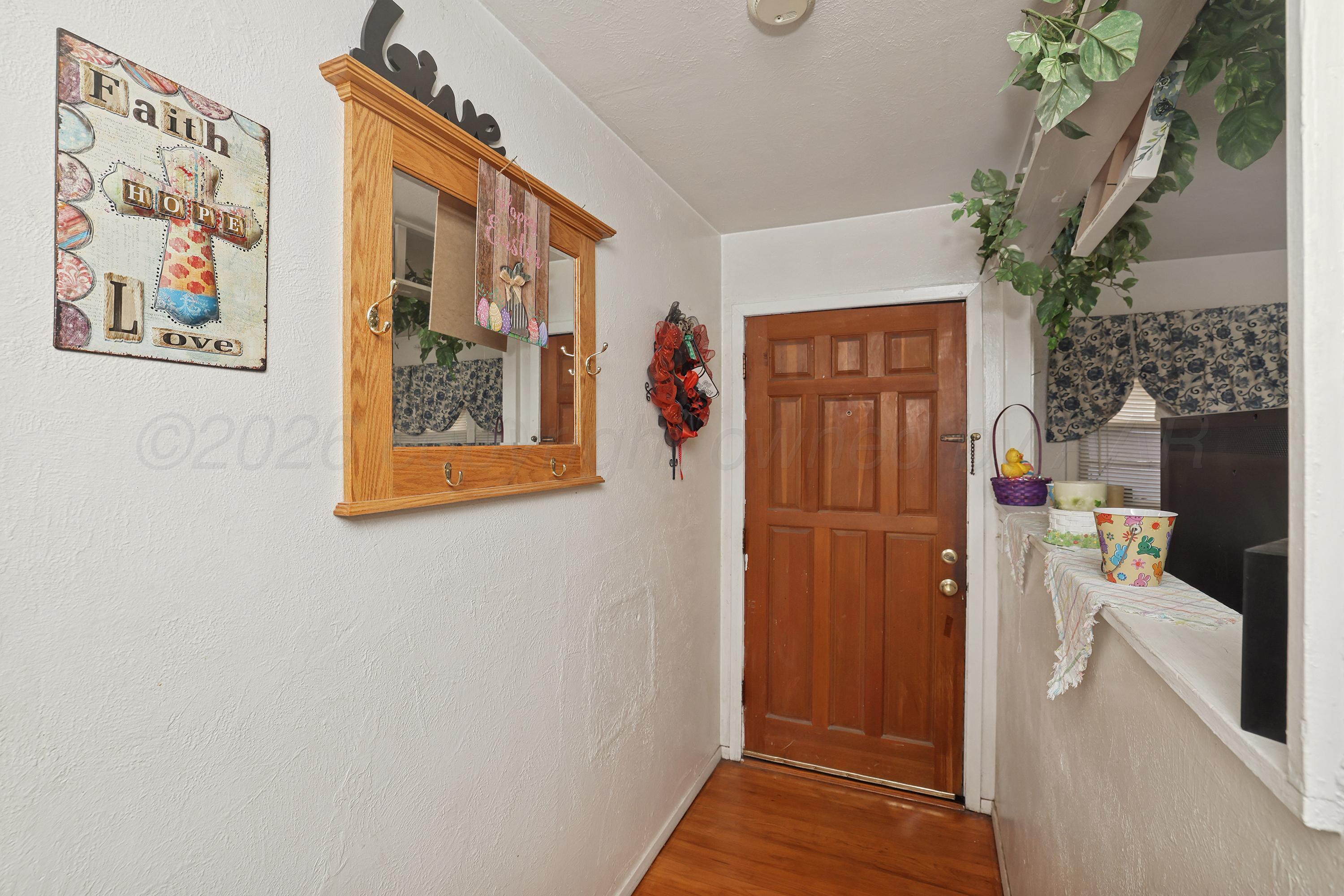 2321 Bell Street Amarillo, TX 79106 - Photo 3 of 24 a view of a hallway with interior of the house