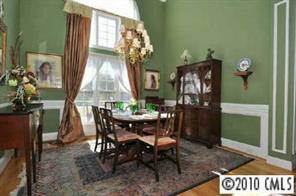 205 Chesterfield Canal Fort Mill, SC 29708 - Photo 3 of 8 a view of a dining room with furniture and chandelier