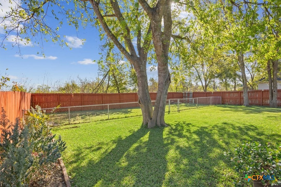 2817 North 12th Street Temple, TX 76501 - Photo 23 of 23 a view of swimming pool with a yard