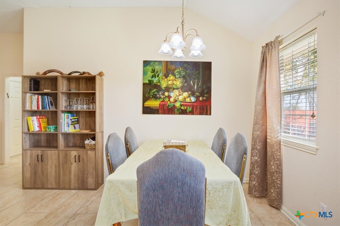 2817 North 12th Street Temple, TX 76501 - Photo 8 of 23 a dining room with furniture and window