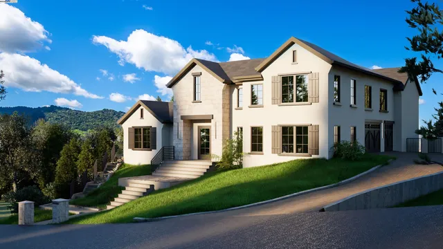 a front view of a house with a yard and trees