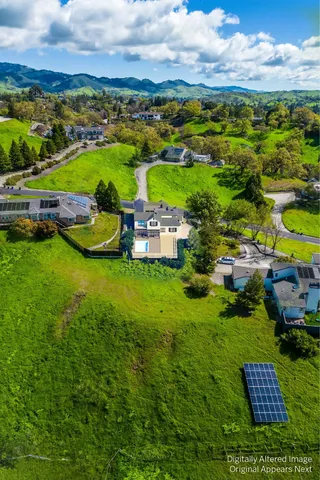 a view of a garden with houses
